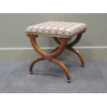 A William IV rosewood stool, with near square tapestry top, on ‘X’ frame supports and ‘acorn’