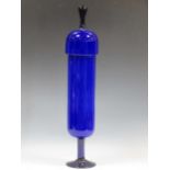 A Chemists blue glass jar and cover, 68cm high