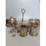 Two small silver tankards, together with a silver rose bowl, a silver cover, a silver cruet frame