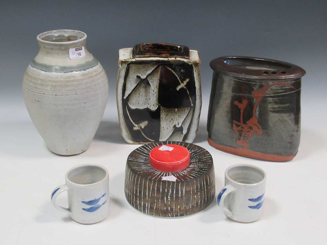 A collection of 20th century studio ceramics, to include two slab built vases, four mugs, a