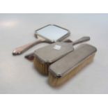 An Art Deco period silver backed dressing table set (4)