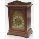 An Edwardian oak mantle clock, the brass dial with Roman chapter ring, CHIME/SILENT dial, 43cm high