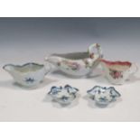 Three 18th century porcelain sauce boats / jugs (damage and restoration), and two small pickle
