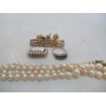 A split pearl memorial brooch, a gate style link brooch, two pairs of ear studs, gross weight 15.6g,