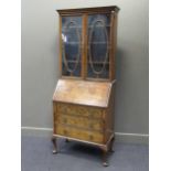 A 1920s walnut bureau bookcase, 196 x 80 x 41cm