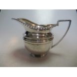 An early 19th century silver milk jug, 11.7ozt