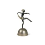 After Josef Lorenzl, a patinated and silvered spelter model of a scarf dancer,