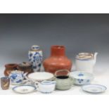 A collection of oriental ceramics, to include various blue and white plates, teapots and a vase