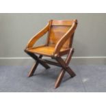 A 19th century oak Glastonbury chair, 82 x 64 x 52cm