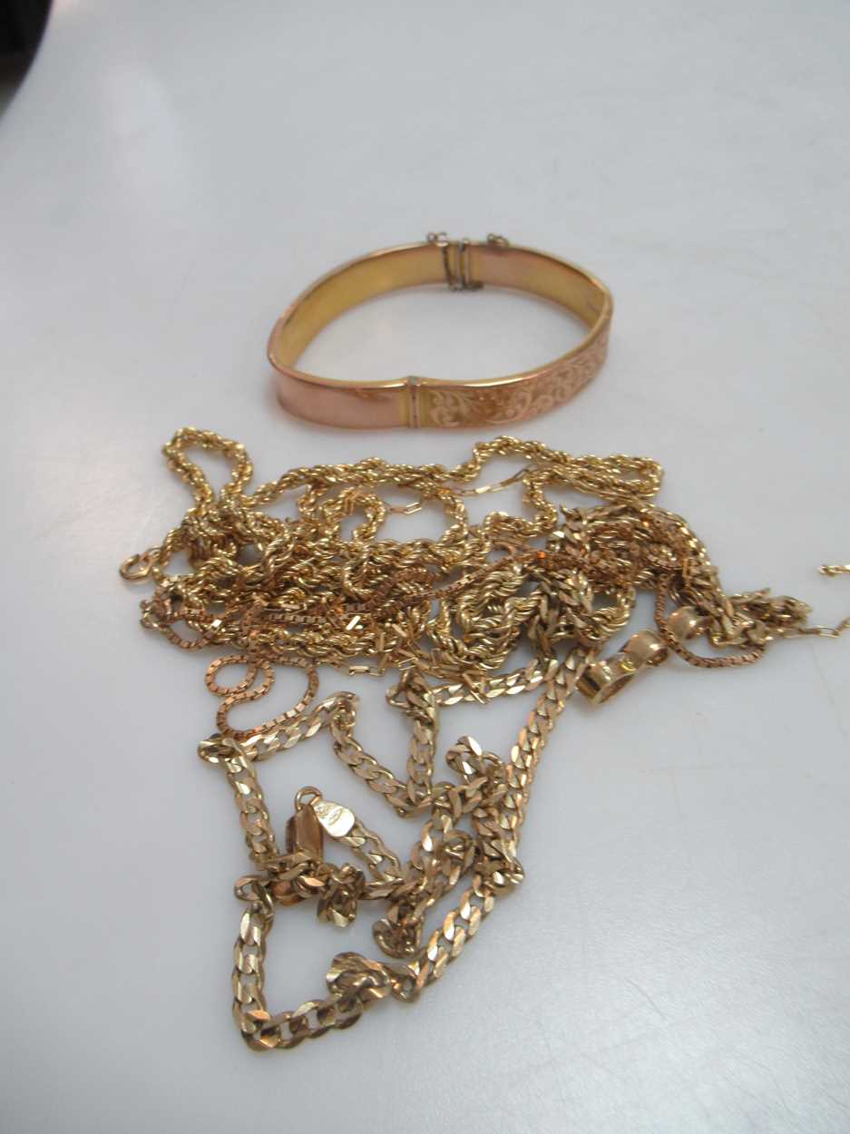 A hallmarked 9ct gold bangle, a hallmarked 9ct gold curb chain, a hallmarked 9ct gold rope chain, - Image 2 of 2