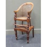 An early 19th century mahogany childs high chair, 93 x 40 x 43cm