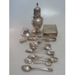 A silver sugar caster, table cigarette box, pill box, inkwell, flatware and filled model of a