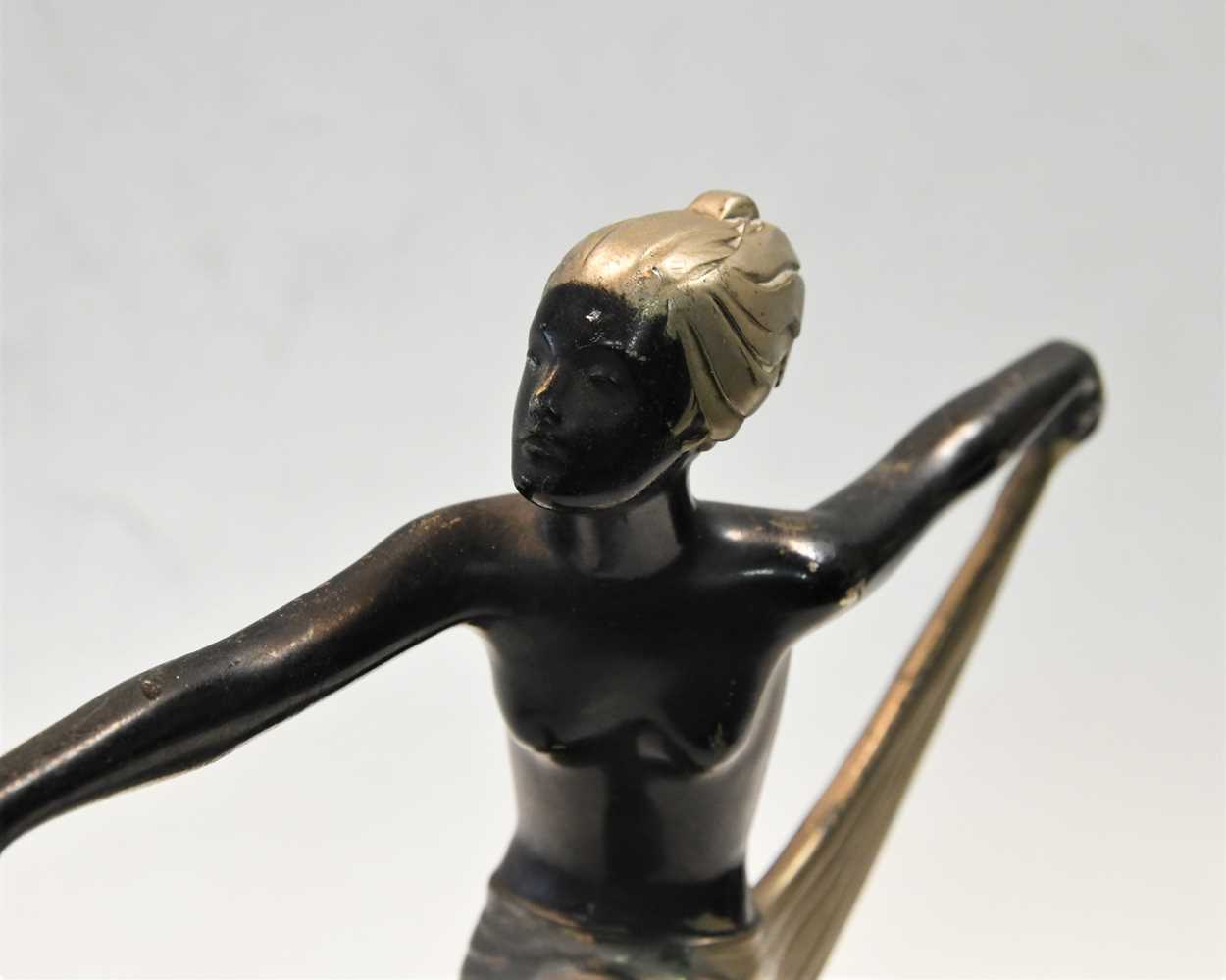 After Josef Lorenzl, a patinated and silvered spelter model of a scarf dancer, - Bild 4 aus 8