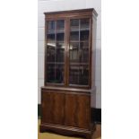 An Edwardian mahogany glazed cabinet rasied on splayed bracket feet 169 x 85 x 35cm together with