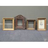 A group of three early 19th century gilt frames with egg and dart moulding, one containing a