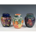 Three large Moorcroft ginger jars and covers: Finches, St Clements and Anemone, tallest 20cm high