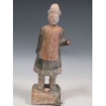 A Tang style figure of an official, 33cm high