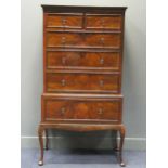 A George II style figured walnut chest on stand, 173 x 94 x 52cm