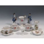 Items of German porcelain to include a two-handled cup and stand, two vases, two cups etc; a pair of