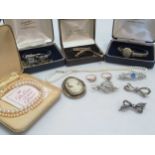 a large collection of costume and silver jewellery, together with an H.L Brown & Son watch with an
