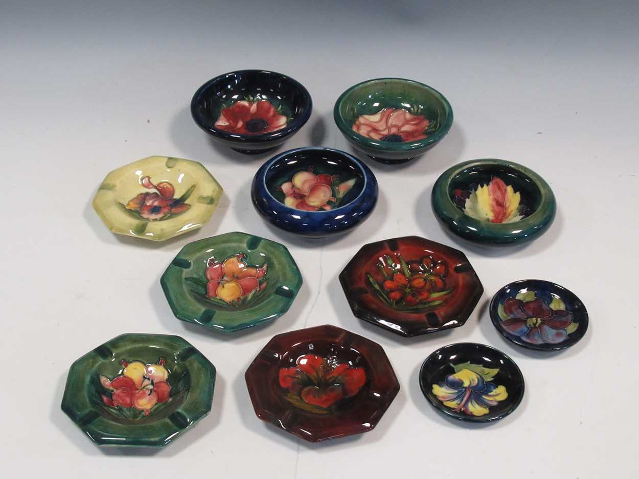 Five Moorcroft octagonal ashtrays and six other small Moorcroft dishes