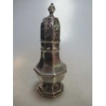 An octagonal silver baluster caster, 1934, 6ozs