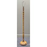 A 20th century walnut bobbin turned standard lamp, 167cm high