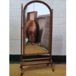 An early 20th century mahogany cheval mirror