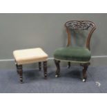 A Victorian carved walnut low chair together with a 19th century mahogany foot stool on turned