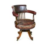 A late Victorian mahogany swivel desk chair,