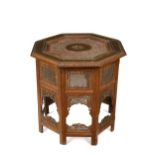 A Hoshiapur pierced and brass-inlaid teak occasional table, circa 1880,