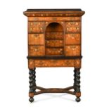 A Dutch walnut and ebonised marquetry cabinet on stand, late 17th century,