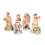 A set of four porcelain figures emblematic of the seasons,