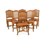 A set of six Louis XV caned side chairs,