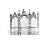 A large wrought iron country house gateway, probably 18th century,