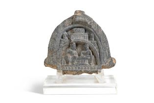 A Gandharan grey schist arched panel of Buddhist devotees, 3rd/4th century,
