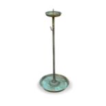 A patinated brass pricket candlestick,