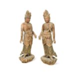 A large pair of Chinese carved wood and polychrome lacquered Bodhisattvas, Qing Dynasty or later,