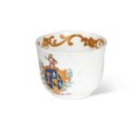 An 18th century continental porcelain armorial cup,