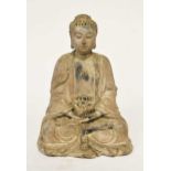 A Chinese wooden figure of a seated meditating Buddha,