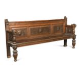 A carved oak hall bench, late 19th century,