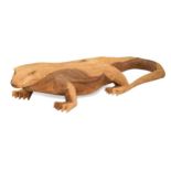 A large carved wood komodo dragon, modern,