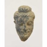 A Gandharan small grey schist head of Buddha, North India/Pakistan, 3rd/4th century,