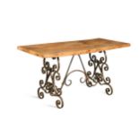 A provincial fruitwood and iron work table, 20th century,