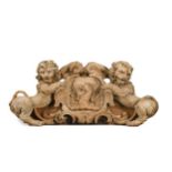 A carved limewood crest, 18th century,