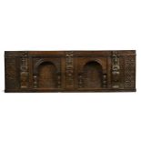 An Elizabethan oak overmantel.