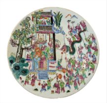 A Chinese famille rose porcelain circular festival plate, late Qing Dynasty, circa 1900,