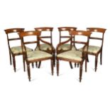 A set of eight Regency mahogany dining chairs,