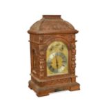 A Victorian carved oak chiming table clock, dated 1888,