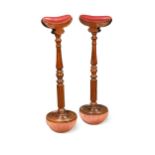 A late Victorian pair of mahogany 'drunken' crutches,